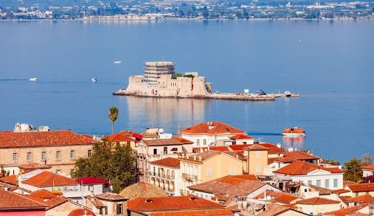 Aerial view of Nafplio old town with Bourtzi Fortress in the Argolic Gulf