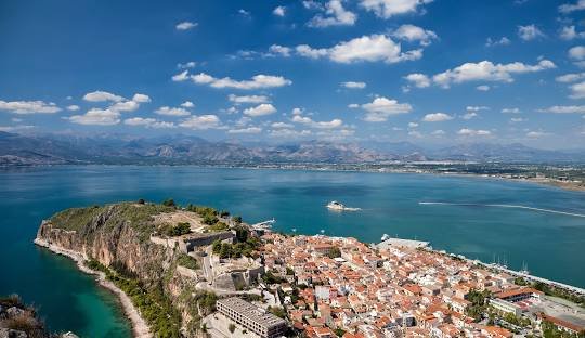 Panoramic view of Nafplio old town, Palamidi Fortress and Argolic Gulf in Greece