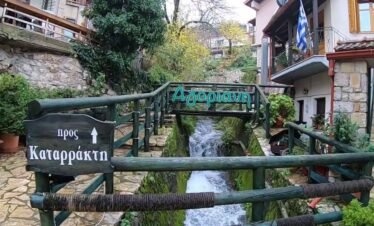 Wooden bridge and stream in Agoriani (Eptalofos), a mountain village on Mount Parnassos, Greece