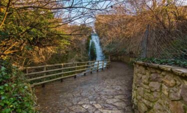 Stone walking path leading to a waterfall in Agoriani (Eptalofos), Mount Parnassos, Greece