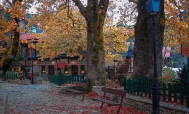 Autumn view of Agoriani (Eptalofos) village square on Mount Parnassos, Greece